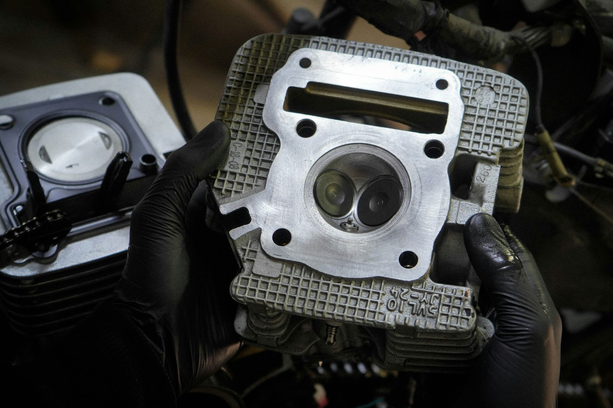 a-close-up-of-a-person-holding-a-metal-object.jpg a close up of a person holding a metal object